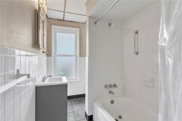 1630 Poplar Way, Braddock, PA 15104 - full bath with tile walls, shower / tub combo, vanity, and a wainscoted wall