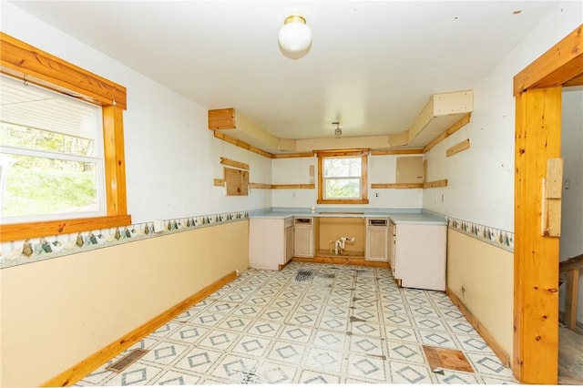 159 Neff Ln, Sewickley Twp, PA 15660 - kitchen featuring light countertops, light flooring, and baseboards