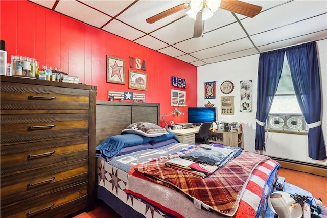 199 Latimer Ave, North Strabane, PA 15363 - bedroom with wood finished floors, a drop ceiling, a ceiling fan, and a baseboard radiator