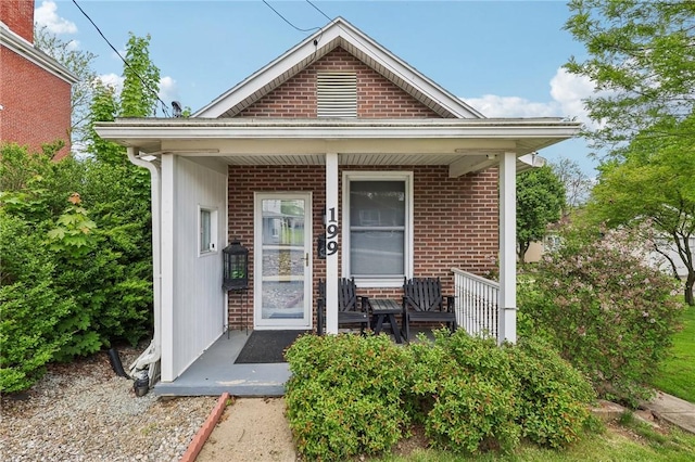 199 Latimer Ave, North Strabane, PA 15363 - entrance to property with covered porch and brick siding