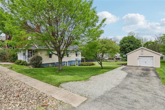 199 Latimer Ave, North Strabane, PA 15363 - view of property exterior featuring a garage, an outbuilding, a lawn, and asphalt driveway
