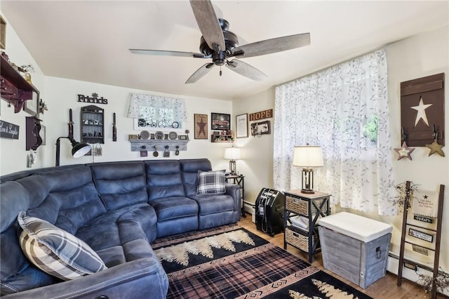 199 Latimer Ave, North Strabane, PA 15363 - living room featuring a ceiling fan, a baseboard heating unit, and wood finished floors