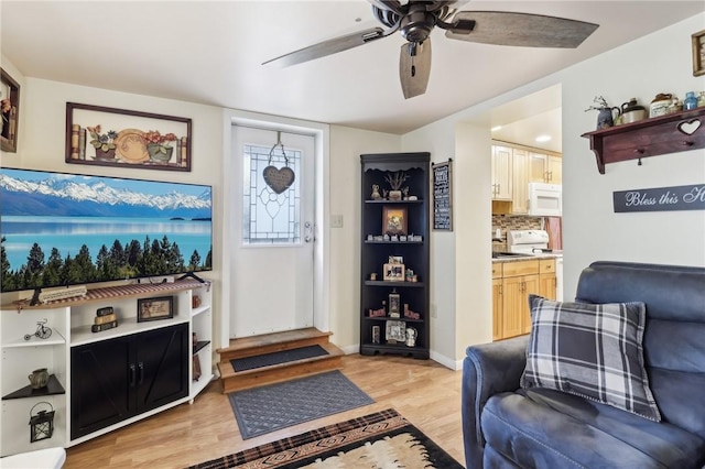 199 Latimer Ave, North Strabane, PA 15363 - living room with light wood-style floors, a ceiling fan, and baseboards
