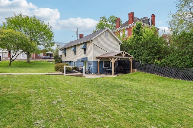 199 Latimer Ave, North Strabane, PA 15363 - back of property with a gazebo, a patio area, and a chimney