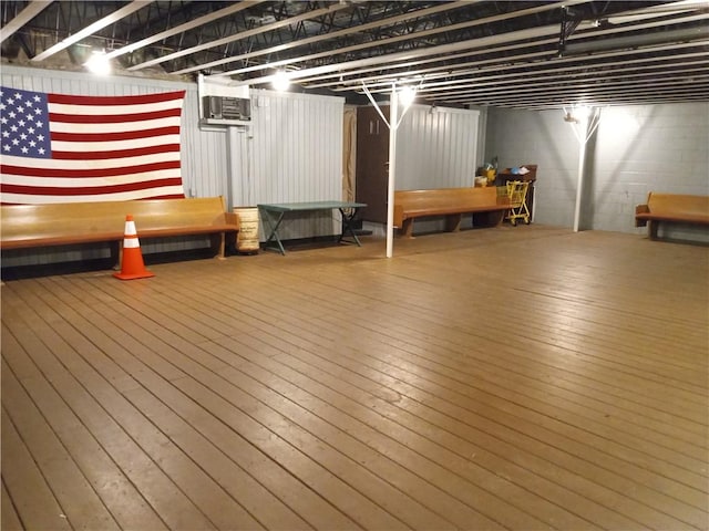 81 Allen St, Allentown, PA 15210 - below grade area featuring wood-type flooring and an AC wall unit