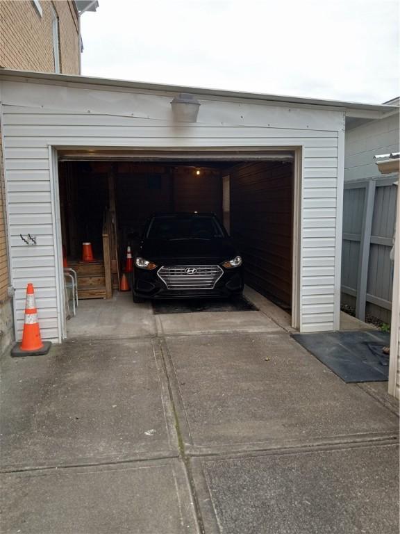 81 Allen St, Allentown, PA 15210 - garage featuring concrete driveway