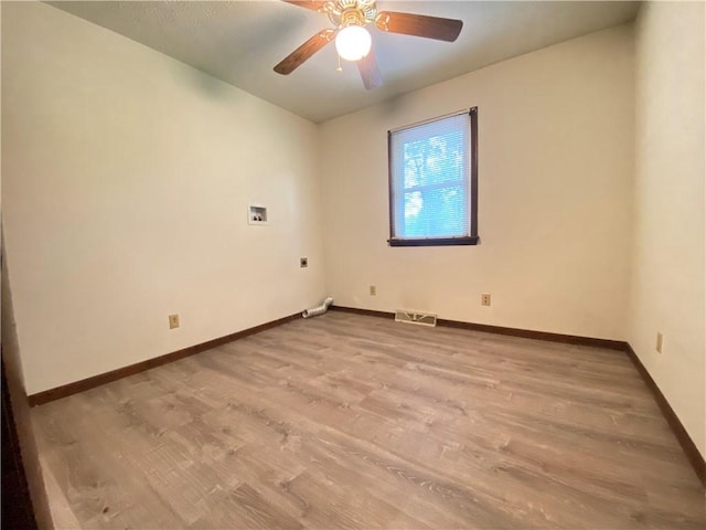 1196 Rutledge Rd, Pymatuning Twp, PA 16154 - unfurnished room with wood finished floors, baseboards, and a ceiling fan