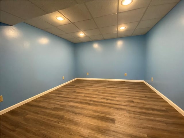1196 Rutledge Rd, Pymatuning Twp, PA 16154 - empty room with wood finished floors, baseboards, recessed lighting, and a paneled ceiling