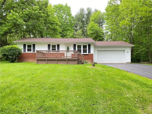 1196 Rutledge Rd, Pymatuning Twp, PA 16154 - single story home featuring driveway, a garage, a front lawn, and brick siding