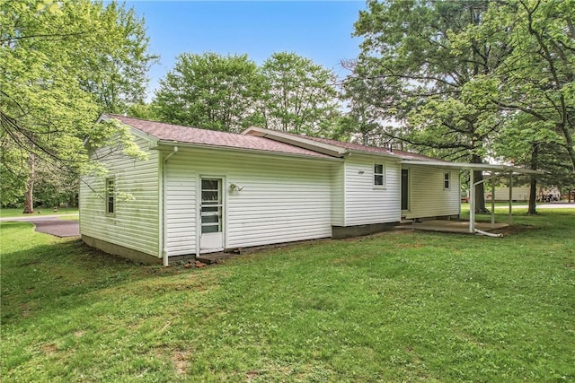 1196 Rutledge Rd, Pymatuning Twp, PA 16154 - back of house featuring a yard and a shingled roof