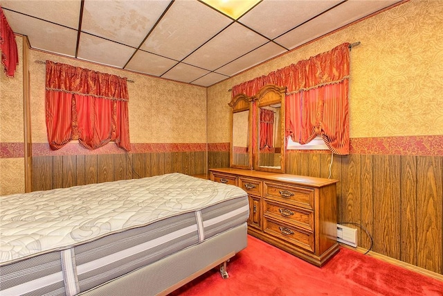 190 W Main St, Donegal Wml, PA 15628 - bedroom featuring wallpapered walls, a wainscoted wall, a drop ceiling, carpet flooring, and wooden walls