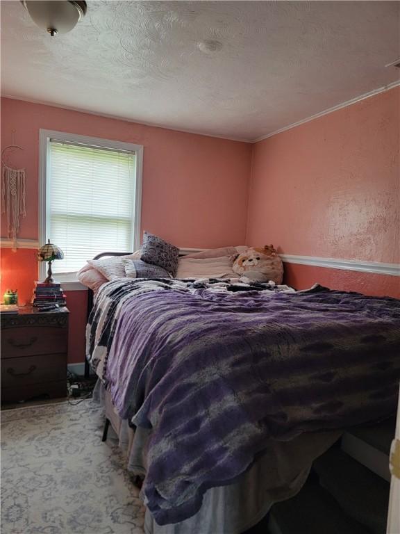 301 Main St, E Mahoning/Marion Ctr, PA 15759 - bedroom featuring light carpet and a textured ceiling