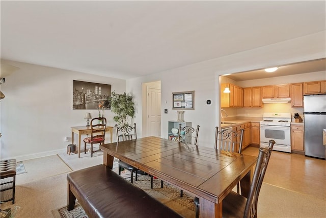 dining room with baseboards