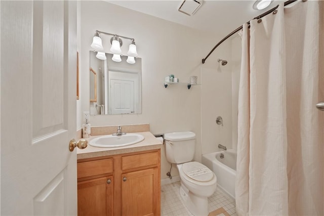 bathroom featuring toilet, vanity, tile patterned flooring, and shower / tub combo with curtain