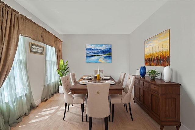 134 Parkhurst St, Central North Side, PA 15212 - dining room featuring baseboards and light wood finished floors