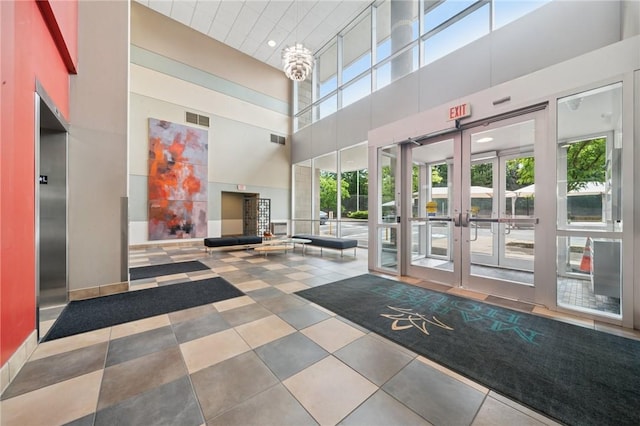 5570 Centre Ave Unit 403, Shadyside, PA 15232 - lobby with a high ceiling and recessed lighting