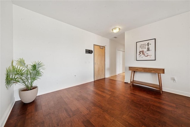 5570 Centre Ave Unit 403, Shadyside, PA 15232 - empty room with wood finished floors and baseboards