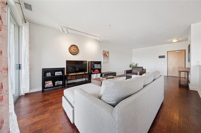5570 Centre Ave Unit 403, Shadyside, PA 15232 - living area with dark wood-style floors, baseboards, and rail lighting