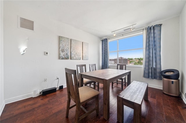 5570 Centre Ave Unit 403, Shadyside, PA 15232 - dining area with baseboards, wood finished floors, and rail lighting