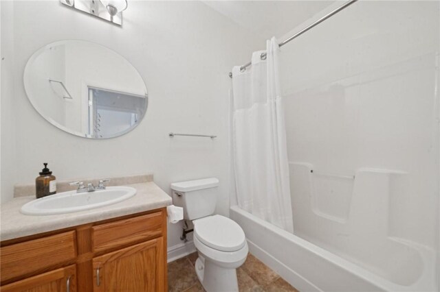 5570 Centre Ave Unit 403, Shadyside, PA 15232 - bathroom featuring toilet, vanity, shower / bath combo, and tile patterned flooring