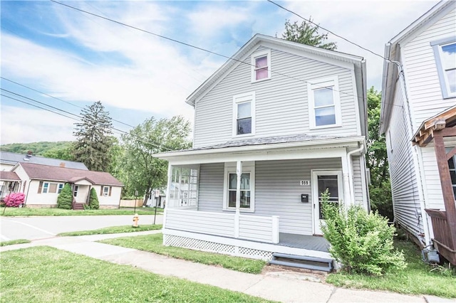 969 Water St, Indiana Boro, PA 15701 - view of front facade with a porch and a front yard