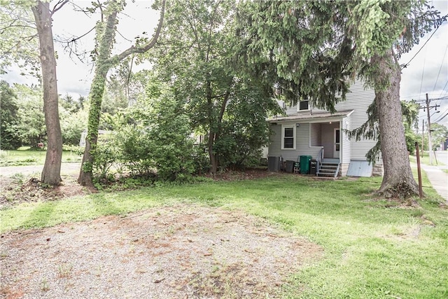 969 Water St, Indiana Boro, PA 15701 - view of grassy yard with central AC and driveway