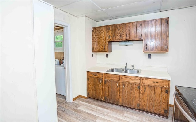 969 Water St, Indiana Boro, PA 15701 - kitchen featuring a sink, electric stove, light wood finished floors, and brown cabinetry