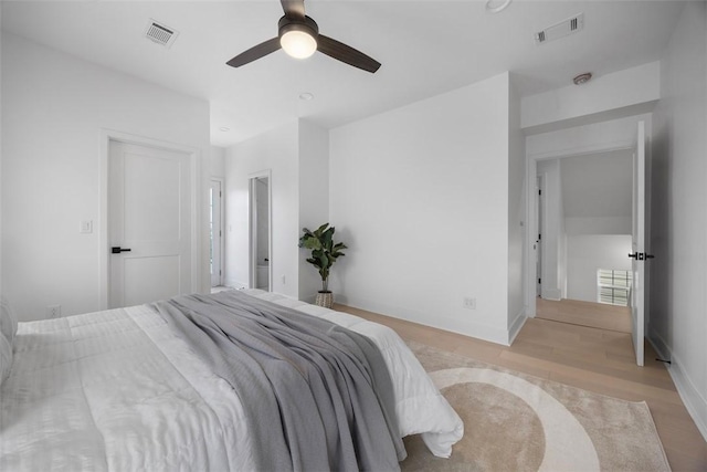 130 Prospect St, Mt Washington, PA 15211 - bedroom with light wood-type flooring, baseboards, and a ceiling fan
