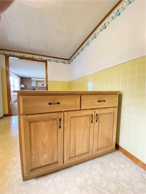 35 Kenmore Rd, West Salem Twp, PA 16125 - bathroom with tile walls, tile patterned floors, and a wainscoted wall