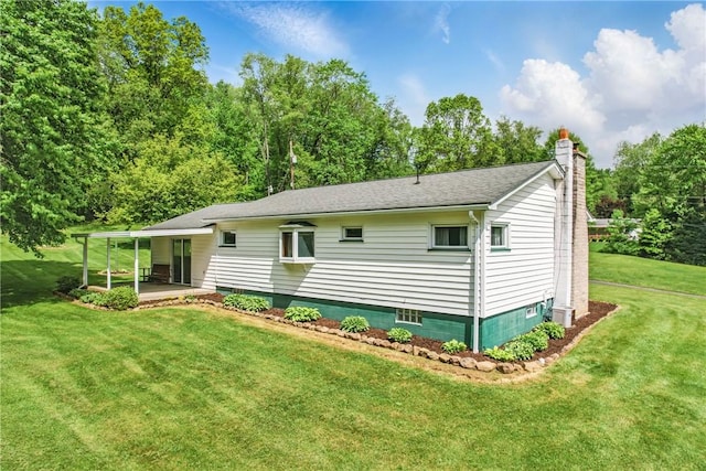 35 Kenmore Rd, West Salem Twp, PA 16125 - back of house featuring a chimney, a lawn, and central air condition unit