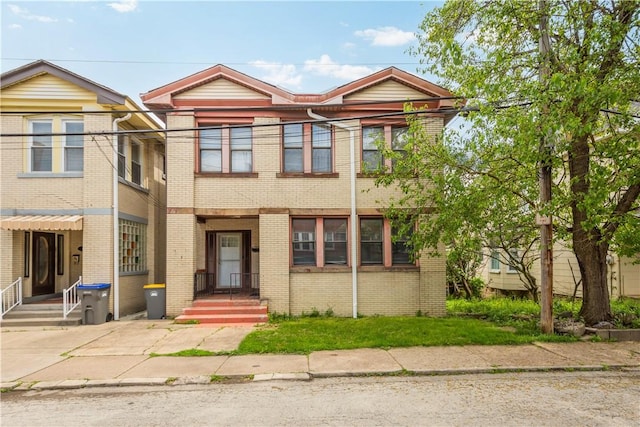 multi unit property featuring brick siding