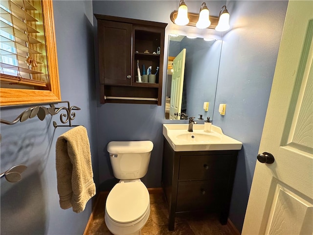 202 Jefferson Ct, Slippery Rock Boro, PA 16057 - bathroom featuring toilet, vanity, and baseboards