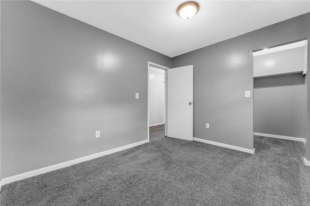 431 Mount Morris Rd, Kirby/Mtmorris, PA 15349 - unfurnished bedroom featuring dark colored carpet and baseboards
