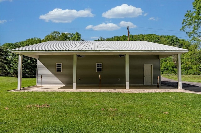 431 Mount Morris Rd, Kirby/Mtmorris, PA 15349 - rear view of house featuring ceiling fan, a patio, a yard, and metal roof