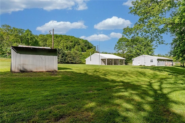 431 Mount Morris Rd, Kirby/Mtmorris, PA 15349 - view of grassy yard with a pole building and an outbuilding