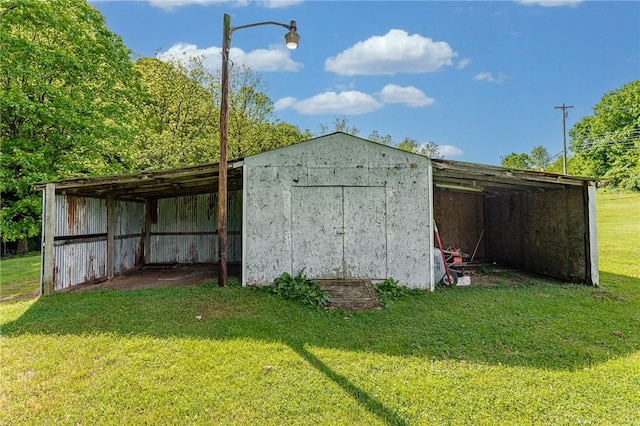 431 Mount Morris Rd, Kirby/Mtmorris, PA 15349 - view of pole building with a yard and a carport