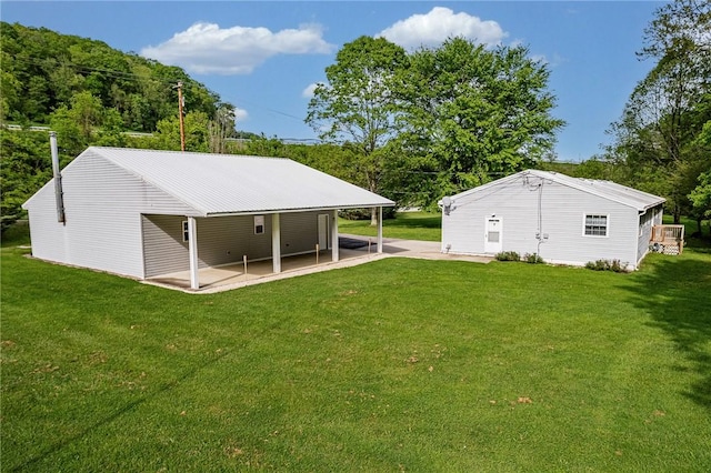 431 Mount Morris Rd, Kirby/Mtmorris, PA 15349 - view of green lawn with a patio