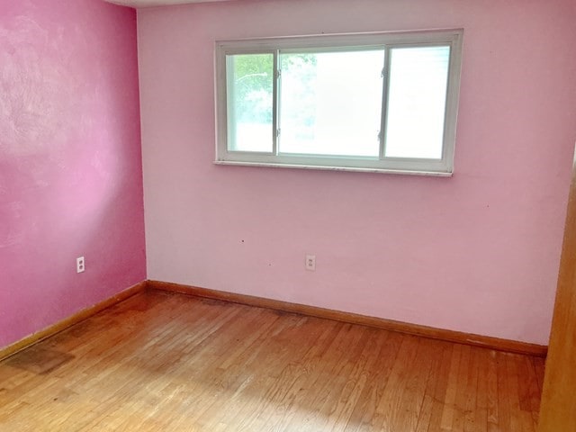 13 Schoen St, Mckees Rocks, PA 15136 - unfurnished room featuring light wood-style flooring and baseboards