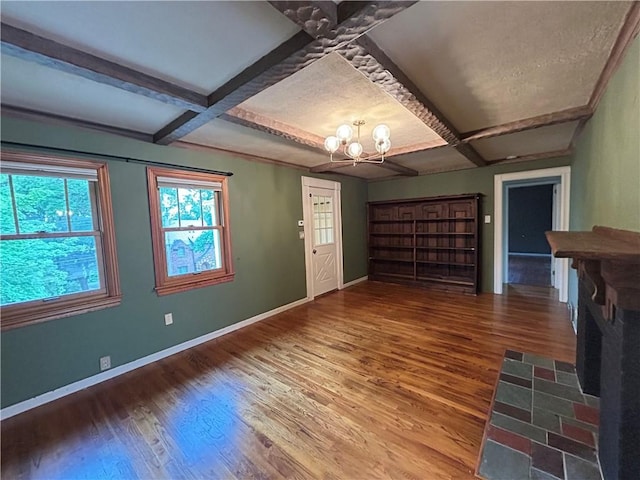 508 Woodside Rd, Forest Hills Boro, PA 15221 - unfurnished living room featuring a chandelier, wood finished floors, baseboards, coffered ceiling, and beamed ceiling