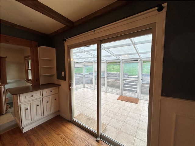 508 Woodside Rd, Forest Hills Boro, PA 15221 - doorway to outside featuring a sunroom and light wood-style floors