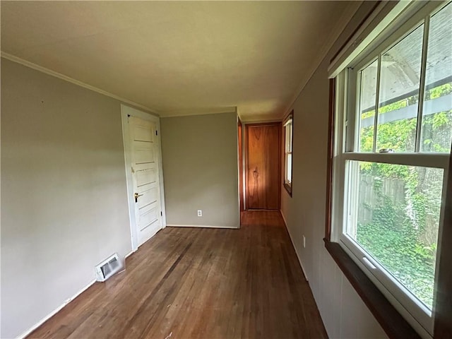 508 Woodside Rd, Forest Hills Boro, PA 15221 - empty room with dark wood-style flooring and ornamental molding