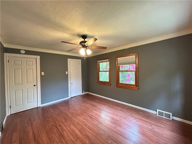 508 Woodside Rd, Forest Hills Boro, PA 15221 - unfurnished bedroom featuring wood finished floors, baseboards, ornamental molding, a closet, and ceiling fan