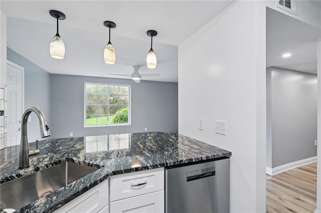 3289 Dawson St Unit 1, Oakland, PA 15213 - kitchen featuring stainless steel dishwasher, a sink, white cabinetry, dark stone countertops, and light wood-style floors