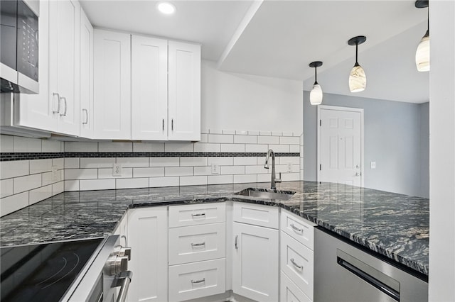 3289 Dawson St Unit 1, Oakland, PA 15213 - kitchen featuring appliances with stainless steel finishes, a sink, white cabinets, backsplash, and recessed lighting