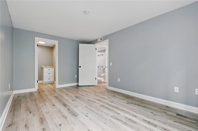 3289 Dawson St Unit 1, Oakland, PA 15213 - unfurnished bedroom with light wood-type flooring, baseboards, and connected bathroom