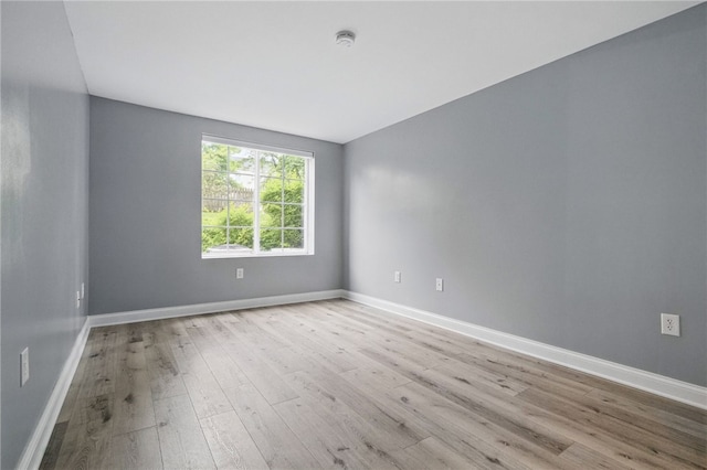 3289 Dawson St Unit 1, Oakland, PA 15213 - unfurnished room with wood finished floors, baseboards, and a smoke detector