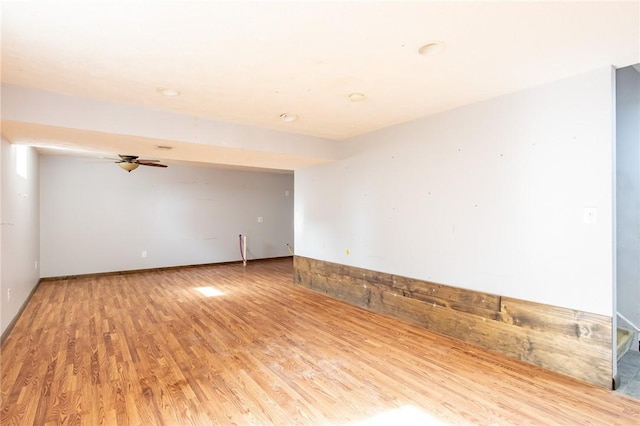 unfurnished room with wood finished floors and recessed lighting