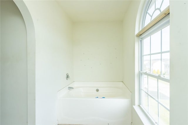 full bathroom featuring a bath