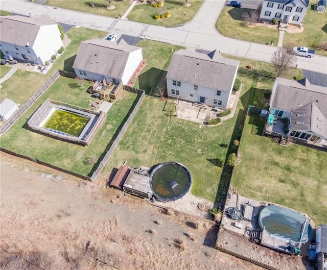 aerial overview of property's location with nearby suburban area