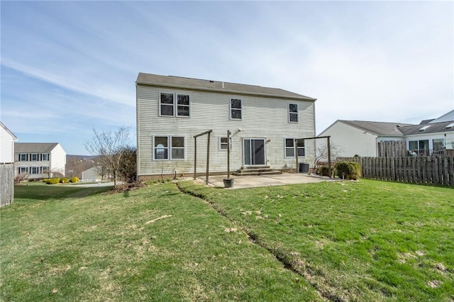 back of house featuring a patio and entry steps